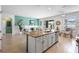 Stylish kitchen with a central island, providing ample counter space and connectivity to living areas at 1613 Lady Fern Trl, Deland, FL 32720