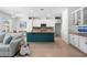Contemporary kitchen featuring a large island, sleek appliances, and an open layout to the living area at 1613 Lady Fern Trl, Deland, FL 32720