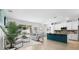 Bright living room with natural light, stylish furnishings, and open access to the kitchen area at 1613 Lady Fern Trl, Deland, FL 32720