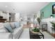 Stylish living room with a comfortable sofa, decorative accents, and an open floor plan at 1613 Lady Fern Trl, Deland, FL 32720