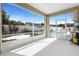Enclosed patio featuring an outdoor view, white walls, and sliding glass doors to a pool at 1613 Lady Fern Trl, Deland, FL 32720