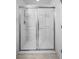 Modern bathroom features an updated walk-in shower with sleek glass doors at 1655 Pham Dr, Port Orange, FL 32129