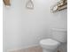 This bathroom features a tiled floor and modern toilet at 1655 Pham Dr, Port Orange, FL 32129