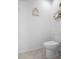 This bathroom features a tiled floor and modern toilet at 1655 Pham Dr, Port Orange, FL 32129