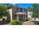 Inviting two-story home boasts a charming covered entrance and well-maintained surroundings at 1655 Pham Dr, Port Orange, FL 32129