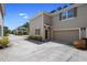 Spacious home features a two-car garage and a well-kept lawn at 1655 Pham Dr, Port Orange, FL 32129