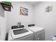 Bright laundry room features new, modern washer and dryer appliances at 1655 Pham Dr, Port Orange, FL 32129