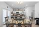 Bright living room with a view into the kitchen and backyard at 1655 Pham Dr, Port Orange, FL 32129