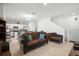 An open concept living space connecting to the kitchen, featuring comfortable seating and stylish decor at 1655 Pham Dr, Port Orange, FL 32129