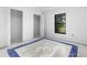 Bedroom featuring closet with bi-fold doors and window offering natural light at 1842 W Cooper Dr, Deltona, FL 32725