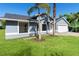 Charming one-story home with lush green lawn at 1842 W Cooper Dr, Deltona, FL 32725