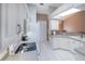 This is a kitchen with white appliances, and white cabinets at 1860 Turnbull Lakes Dr, New Smyrna Beach, FL 32168