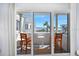 Balcony view showcasing the beachfront location, palm trees, and ocean views, inviting outdoor relaxation at 1926 Ocean Shore Blvd # 3050, Ormond Beach, FL 32176