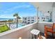 Ocean view from balcony with a shared pool in sight creating a resort-like atmosphere for leisure and enjoyment at 1926 Ocean Shore Blvd # 3050, Ormond Beach, FL 32176