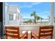 Ocean view from balcony, showcasing the stunning beachfront location, palm trees, and the endless horizon at 1926 Ocean Shore Blvd # 3050, Ormond Beach, FL 32176