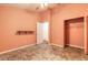 Bedroom featuring stylish floors, a ceiling fan, and a closet for storage at 1927 Orange Tree Dr, Edgewater, FL 32141