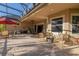 Large brick patio featuring outdoor seating areas and covered screening at 202 Westcott Ct, Deland, FL 32724