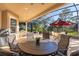 Comfortable outdoor dining area and screened patio at 202 Westcott Ct, Deland, FL 32724