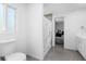 Bathroom featuring toilet, vanity, tile floors and shower with curtain at 2048 Laredo Dr, Deltona, FL 32738