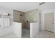 Walk-in shower with tile and new shower head at 2048 Laredo Dr, Deltona, FL 32738