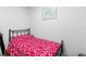 Bedroom featuring an ornate bedframe, minimal furnishings, and light paint at 2048 Laredo Dr, Deltona, FL 32738