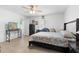 Spacious bedroom featuring a bed, ceiling fan, and closet at 2048 Laredo Dr, Deltona, FL 32738