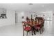 Dining room area featuring a wooden table with six chairs at 2048 Laredo Dr, Deltona, FL 32738