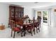 Dining area featuring a wooden table with six chairs with backyard view at 2048 Laredo Dr, Deltona, FL 32738