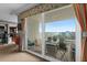 Bright living room with balcony access and ocean views at 2071 S Atlantic Ave # 705, Daytona Beach, FL 32118