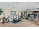 Comfortable living room featuring an open layout, seamlessly connected to the kitchen and bar area at 2071 S Atlantic Ave # 705, Daytona Beach, FL 32118