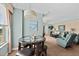 Inviting living space with a dining area, creating a comfortable and versatile area for relaxation and entertainment at 2071 S Atlantic Ave # 705, Daytona Beach, FL 32118