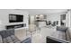 Spacious open-concept living area with a kitchen and dining area visible at 223 Courtland Blvd, Deltona, FL 32738