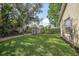 Beautiful backyard with a lush lawn and attractive landscaping features at 227 Heronwood Cir, Deltona, FL 32725