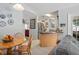 Cozy dining area adjacent to the kitchen, featuring a round wooden table at 227 Heronwood Cir, Deltona, FL 32725
