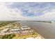 Stunning aerial view of the waterfront and neighborhood showcasing the community's prime location at 241 Riverside Dr # 2110, Daytona Beach, FL 32117