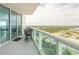 Spacious balcony with seating and a view, seamlessly connecting indoor and outdoor living spaces at 241 Riverside Dr # 2110, Daytona Beach, FL 32117