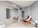 Bedroom with closet that has sliding mirrored doors, gray walls, and tile floors at 241 Riverside Dr # 2110, Daytona Beach, FL 32117