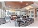 Elegant community room with comfortable seating, a pool table, and stylish decor for social gatherings at 241 Riverside Dr # 2110, Daytona Beach, FL 32117