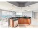 Modern kitchen featuring stainless steel appliances and sleek countertops with views of the water at 241 Riverside Dr # 2110, Daytona Beach, FL 32117