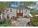 Cozy shed exterior with stone pathway, perfect spot for relaxation or hobbies at 2427 Beck Cir, Deltona, FL 32738