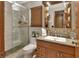 Bathroom featuring glass shower, updated vanity, and modern fixtures at 2427 Beck Cir, Deltona, FL 32738