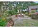 Lush garden with comfortable bench seating, perfect for relaxation and enjoying the scenery at 2427 Beck Cir, Deltona, FL 32738