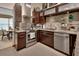 Well-equipped kitchen features stainless steel appliances and sleek modern cabinetry at 2427 Beck Cir, Deltona, FL 32738