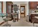 Chic breakfast nook and adjacent workstation in the kitchen area offer great convenience at 2427 Beck Cir, Deltona, FL 32738