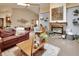 Bright living room with a fireplace, comfortable sofa, coffee table, and open layout at 2427 Beck Cir, Deltona, FL 32738