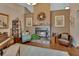 Cozy living room featuring a fireplace, plush furniture, and a warm ambiance at 2427 Beck Cir, Deltona, FL 32738