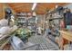 Shed interior with organized storage shelves and space for creative projects at 2427 Beck Cir, Deltona, FL 32738