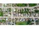 Aerial view of property showcasing surrounding neighborhood and landscaping at 2466 Candlewick St, Deltona, FL 32738
