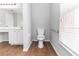 Neutral bathroom featuring a toilet and tiled floor at 2466 Candlewick St, Deltona, FL 32738