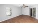 Sun-filled bedroom with window and sliding door at 2466 Candlewick St, Deltona, FL 32738